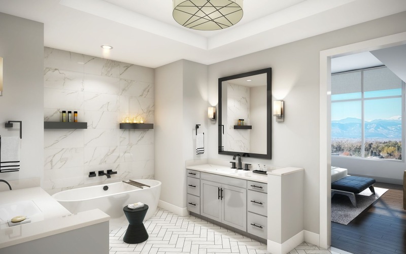 Bright and generous sized bathroom with luxe finishes and a deep garden tub