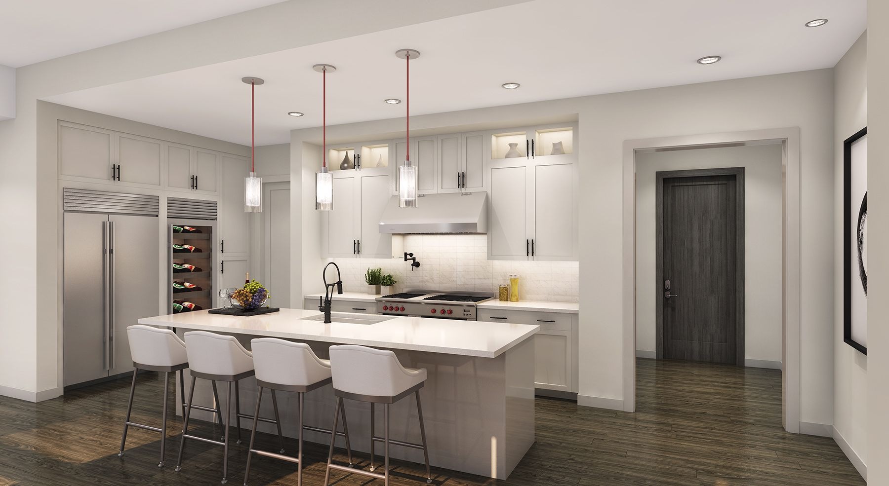 Wide shot of bright kitchen with large island, paneled refrigerator and freezer combo, wine refrigerator, and designer lighting