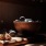 Close up of figs on a naturally yet dimly lit kitchen counter 