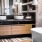 Bathroom showing double vanity sinks and a garden tub